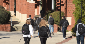 students walking on a college campus