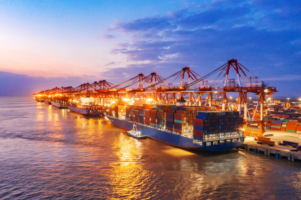 container ship port at sunset