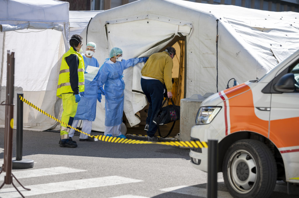 mass triage tents and healthcare workers