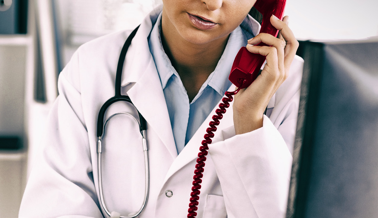 healthcare worker on phone