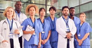 healthcare workers standing outside hospital looking cool