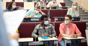 students in masks in a classroom