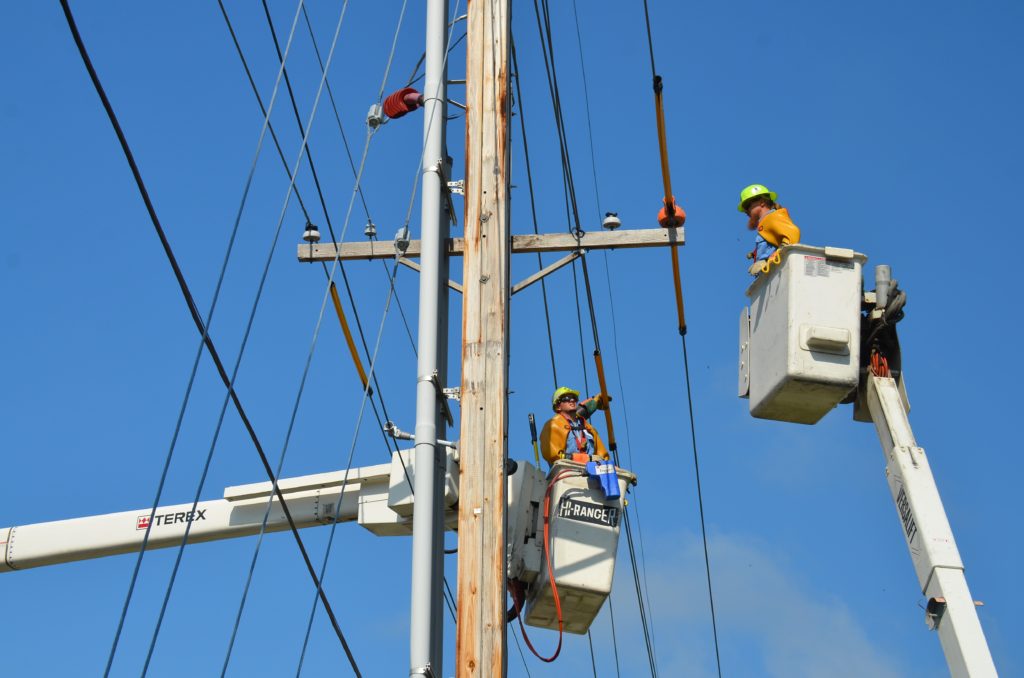 Linemen working on power lines