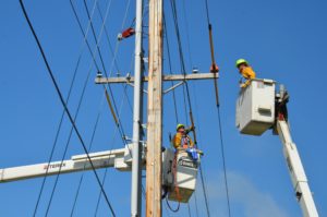 Linemen working on power lines